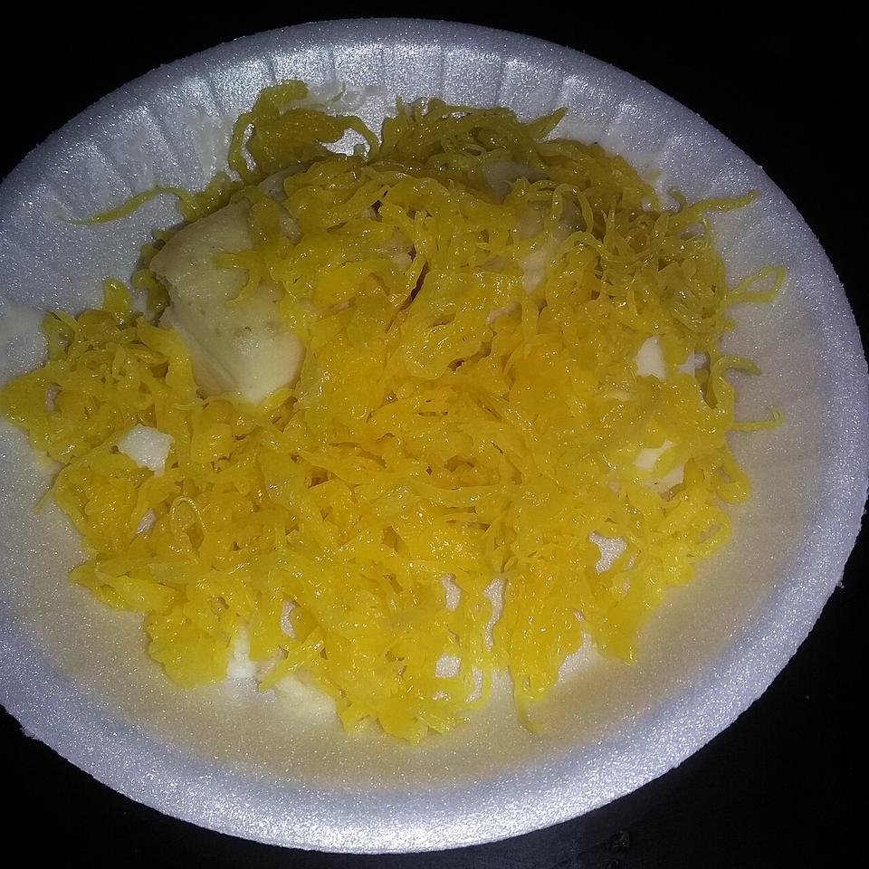 Golden egg-yolk strands of Muttamala on a plate