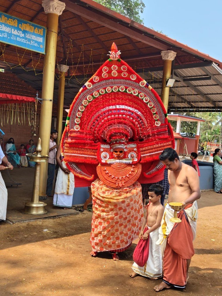 Arya Poonkani Theyyam in ritual attire