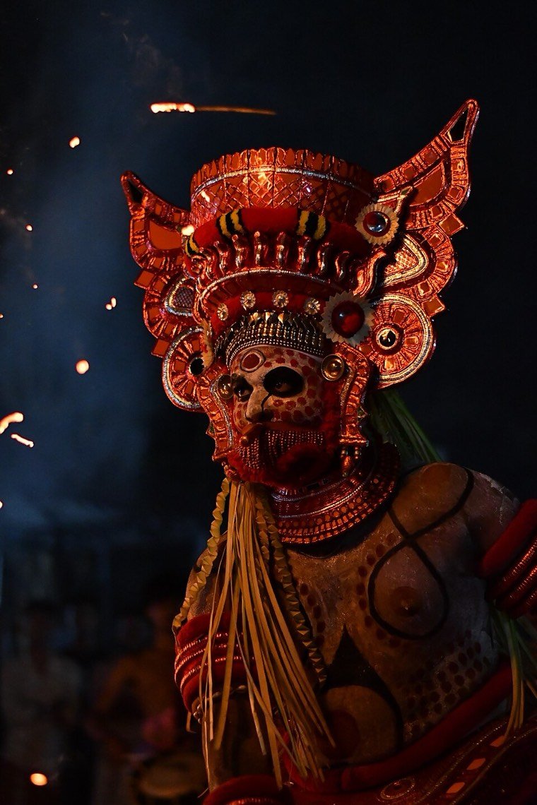 Close view of the Bappiriyan Theyyam face and headdress