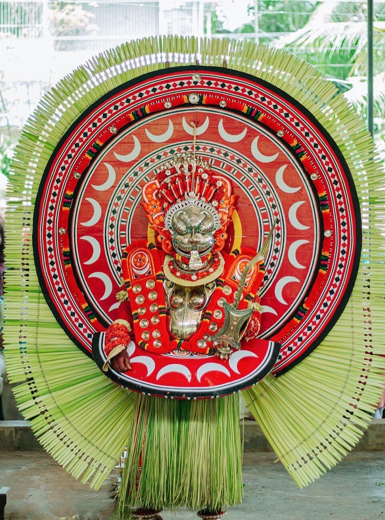 Chamundi Theyyam in ritual attire