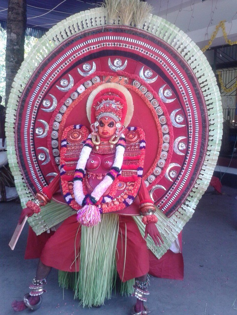 Chamundi Theyyam during a ritual in North Malabar, Kerala