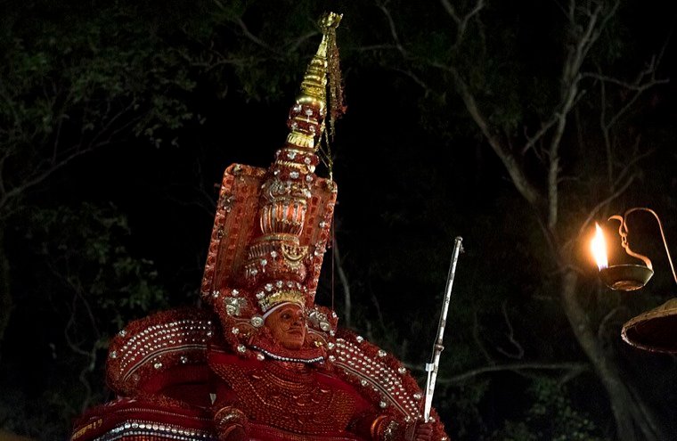 Daivathar Theyyam during a ritual in North Malabar, Kerala