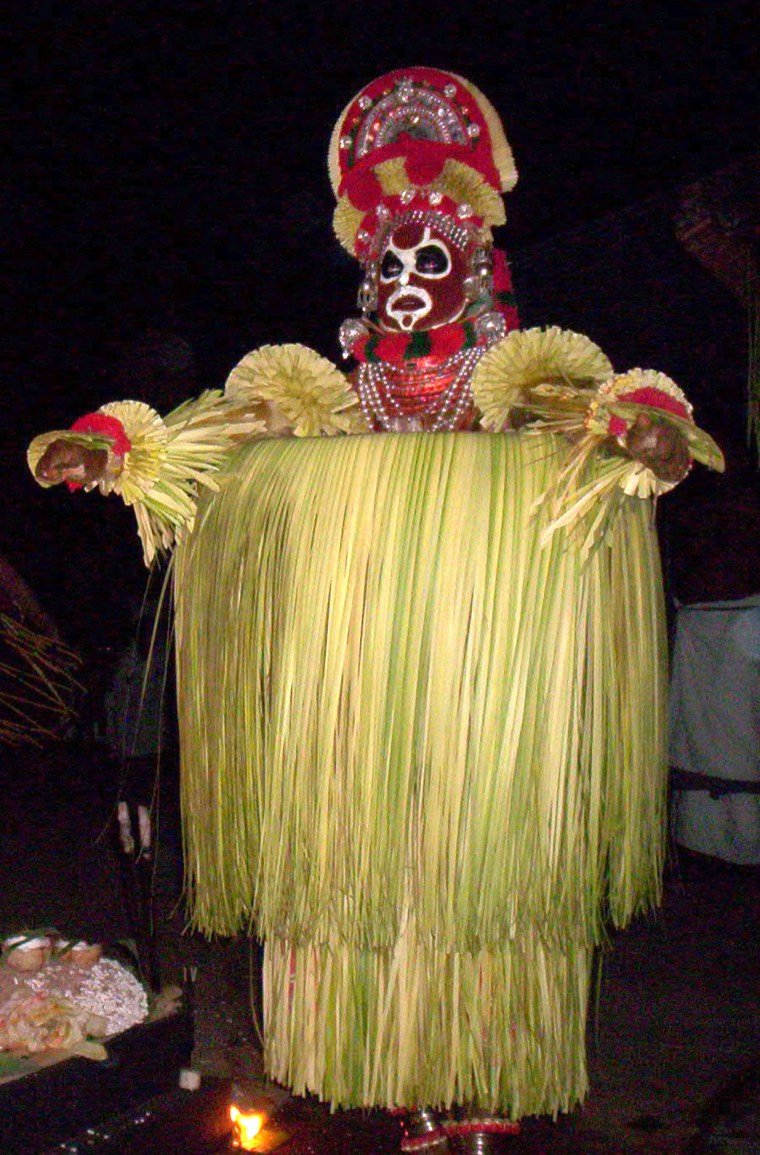 Karimchamundi Theyyam in ritual attire