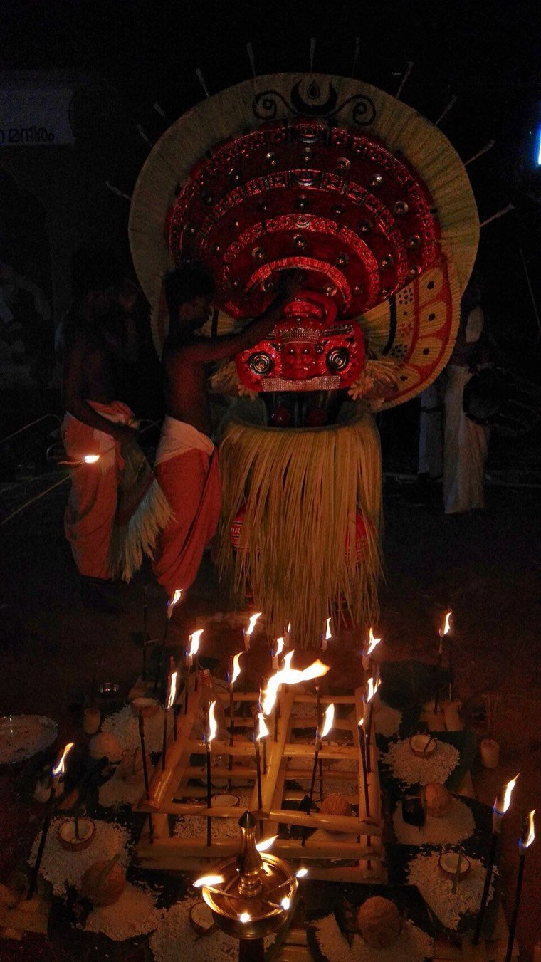 Karimchamundi Theyyam during a ritual in North Malabar, Kerala