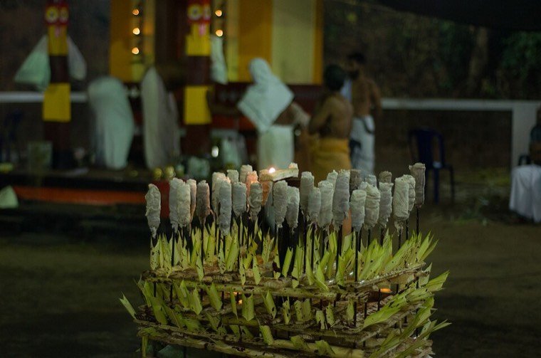 Close view of the Kathivanoor Veeran Theyyam face and headdress