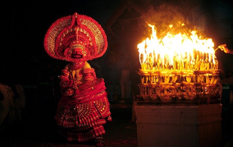 Kathivanoor Veeran Theyyam during a ritual in North Malabar, Kerala