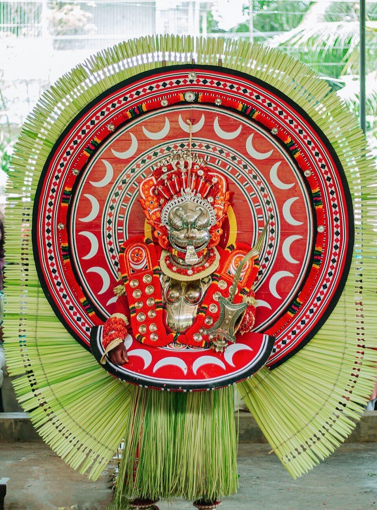 Kundora Chamundi Theyyam during a ritual in North Malabar, Kerala