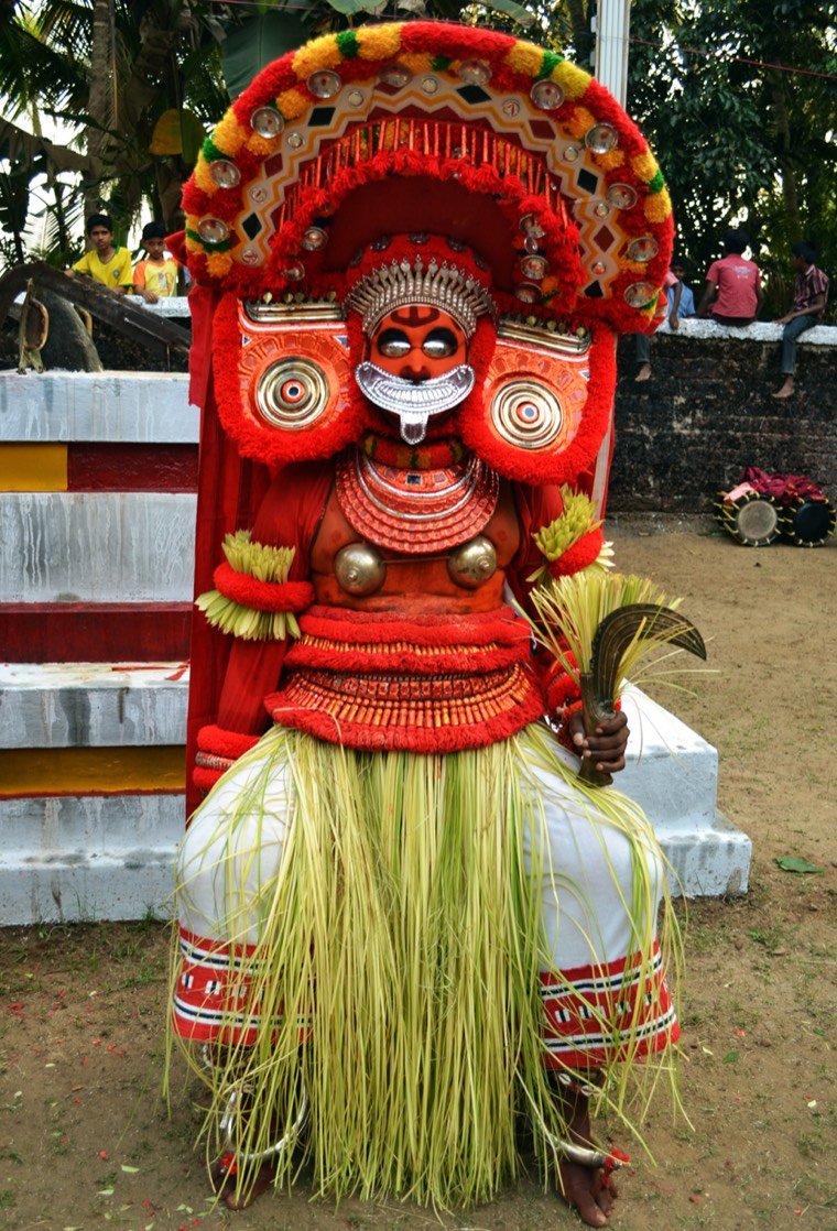Close view of the Kurathi Amma Theyyam face and headdress