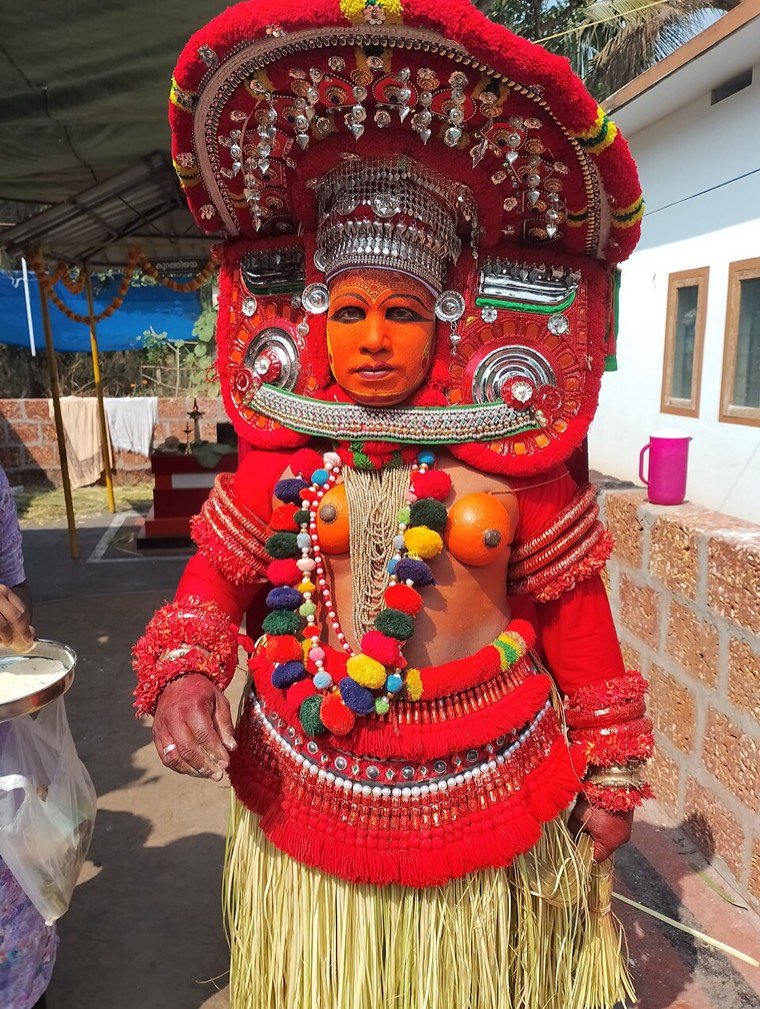 Kurathi Amma Theyyam during a ritual in North Malabar, Kerala