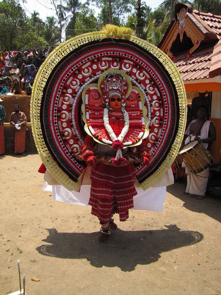 Madayil Chamundi Theyyam in ritual attire