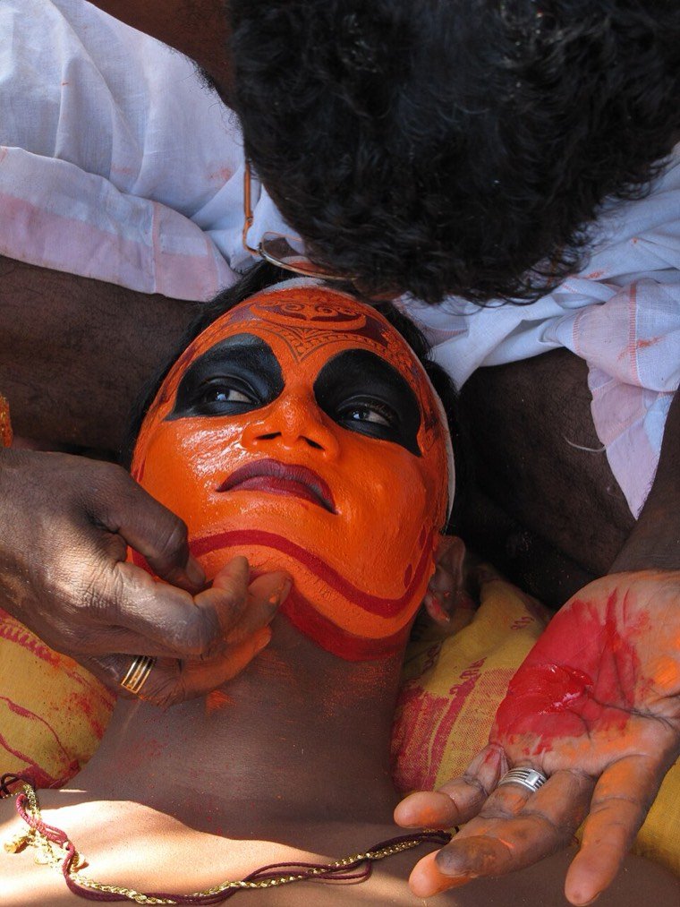 Madayil Chamundi Theyyam during a ritual in North Malabar, Kerala