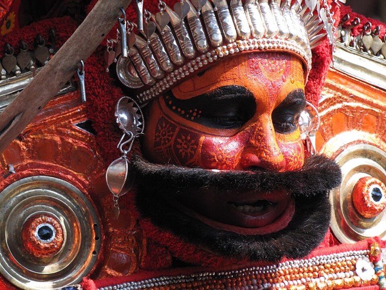 Poomaruthan Theyyam in ritual attire