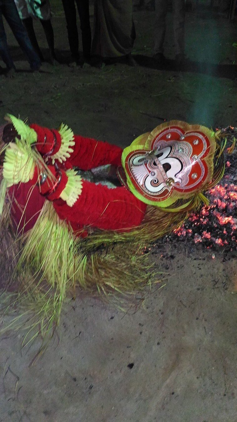 Close view of the Pottan Theyyam face and headdress