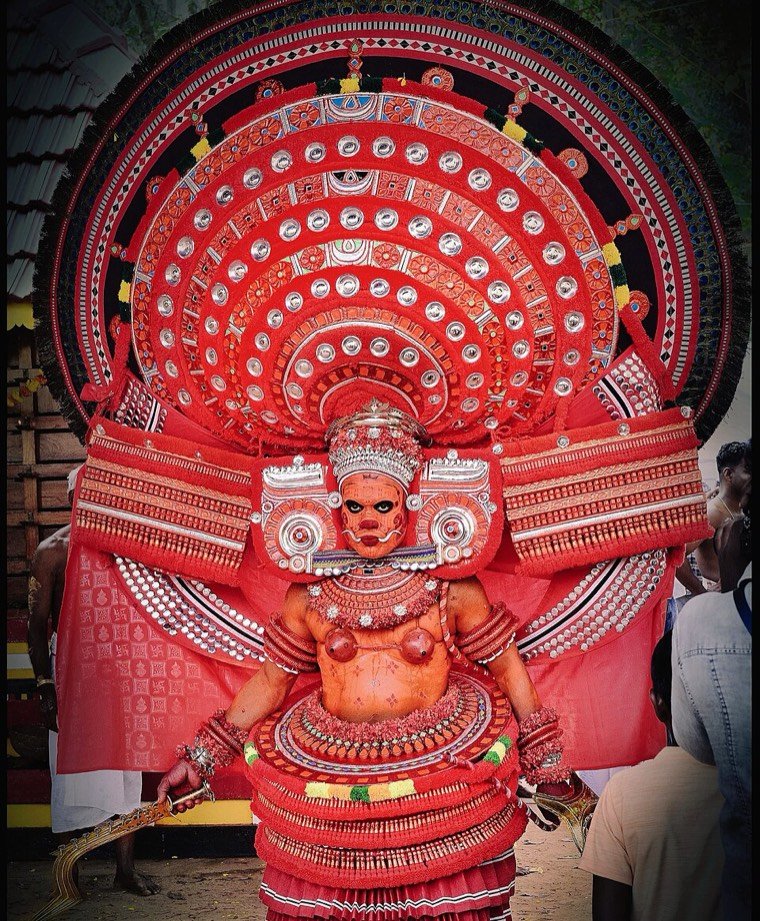 Puli Daivam Theyyam in ritual attire