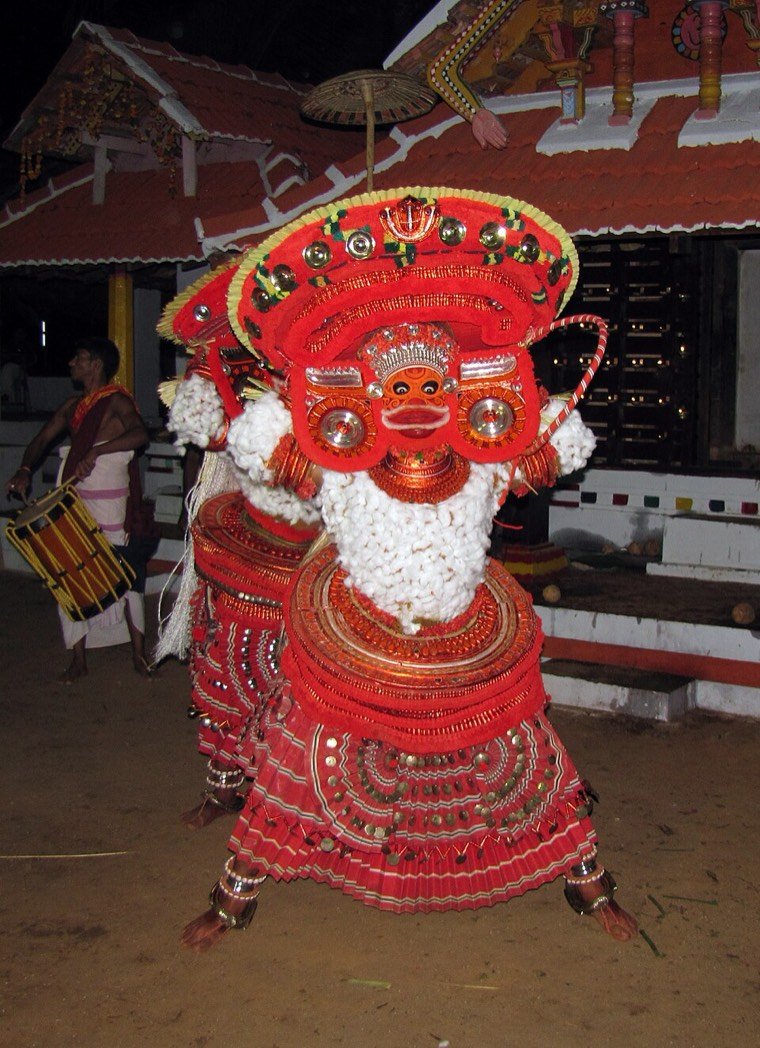 Pulikandan Theyyam during a ritual in North Malabar, Kerala