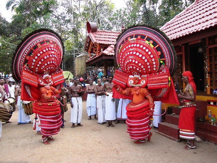 Pulikarinkali Theyyam in ritual attire