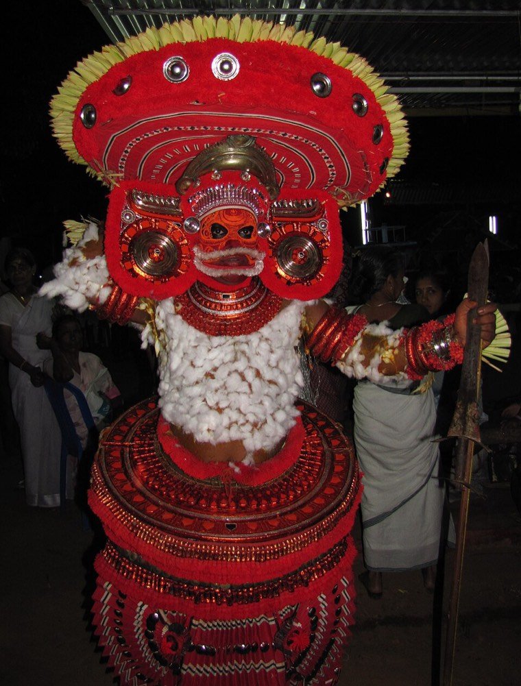 Puliyoor Kannan Theyyam during a ritual in North Malabar, Kerala