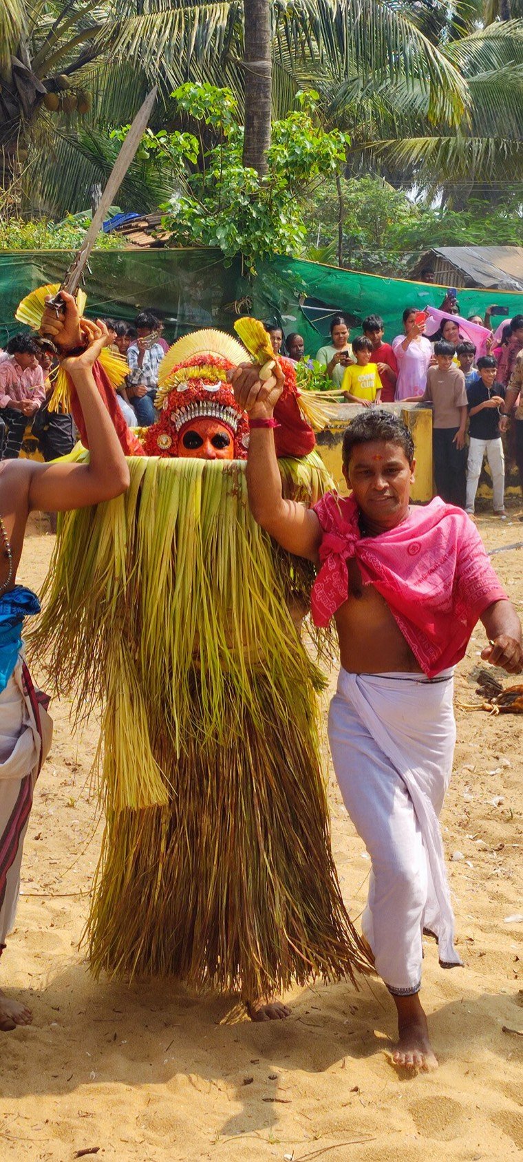 Close view of the Theechamundi Theyyam face and headdress