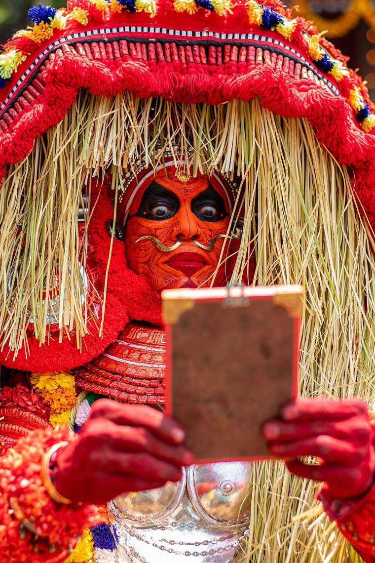 Close view of the Uchitta Bhagavathy Theyyam face and headdress