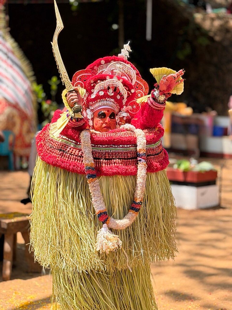 Vishnumoorthi Theyyam in ritual attire